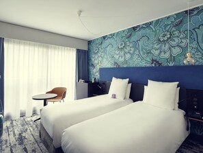 Premium bedding, pillow-top beds, free minibar, in-room safe