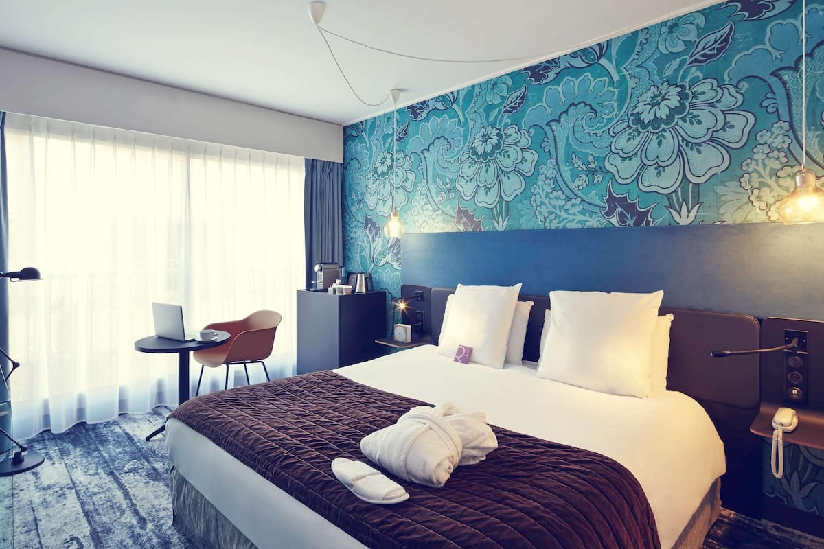 Premium bedding, pillow-top beds, free minibar, in-room safe