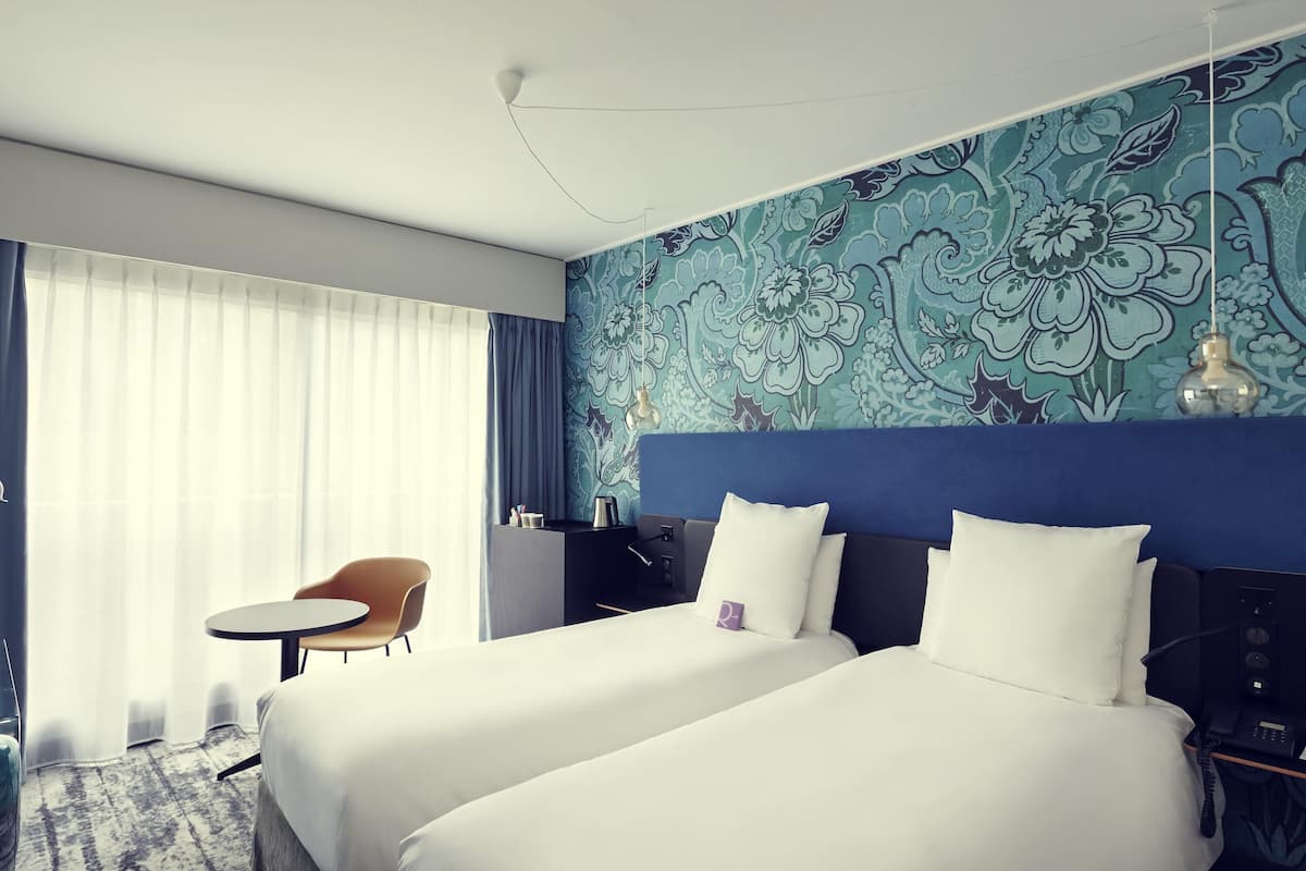 Premium bedding, pillow-top beds, in-room safe, blackout curtains