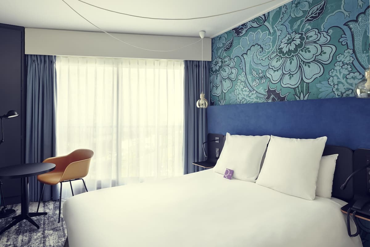 Premium bedding, pillow-top beds, in-room safe, blackout curtains