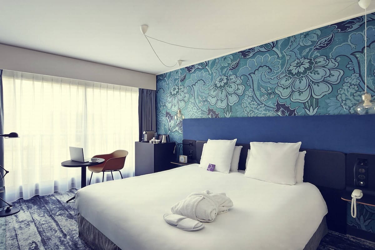 Premium bedding, pillow-top beds, free minibar, in-room safe