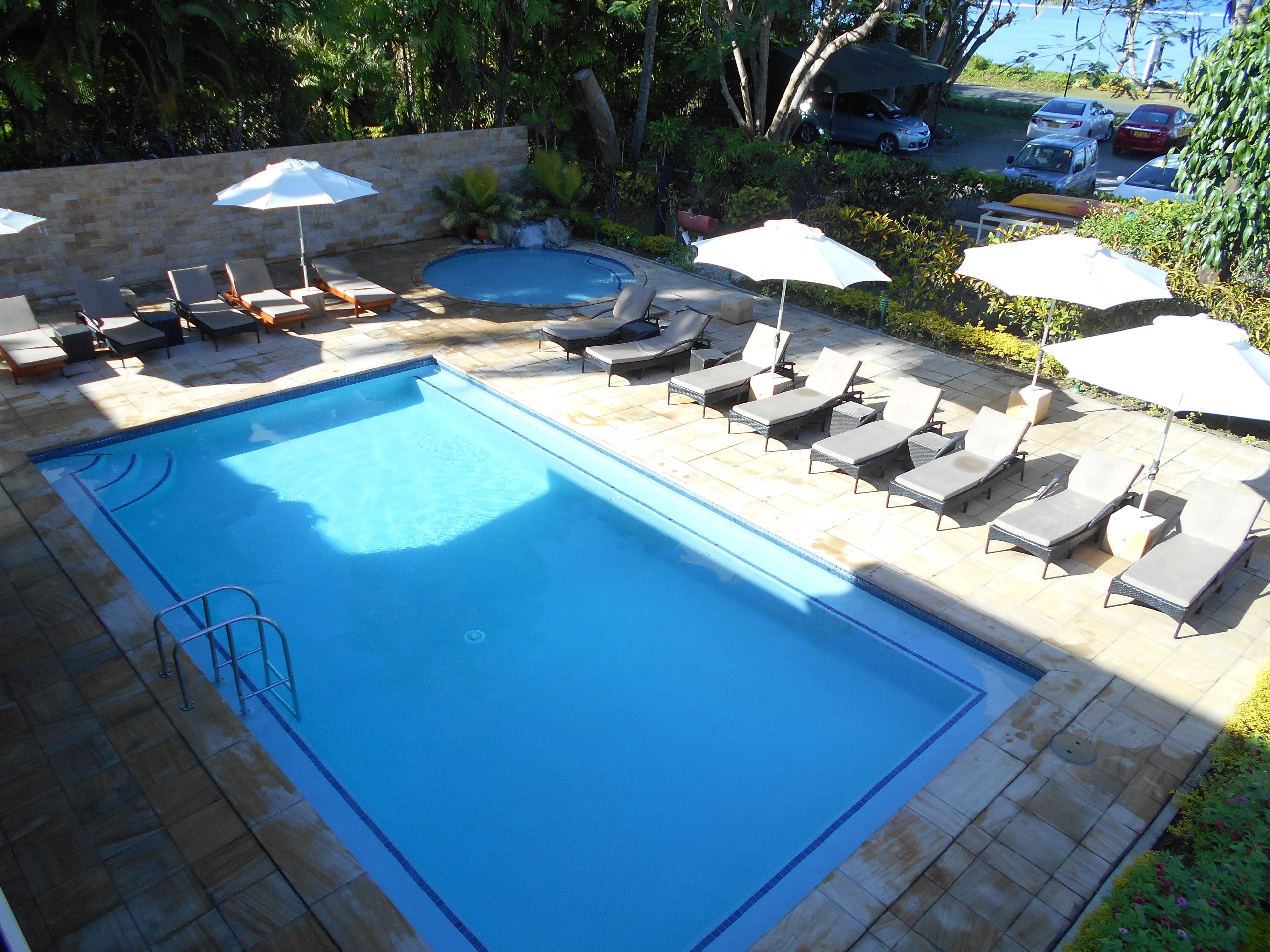 outdoor pool, open 8:00 am to 7:00 pm, free pool cabanas, pool umbrellas