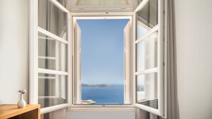 Classic Twin Room (Window to Caldera & Volcano View) | Minibar, in-room safe, WiFi (free), bed sheets - Atlantis (Santorini)
