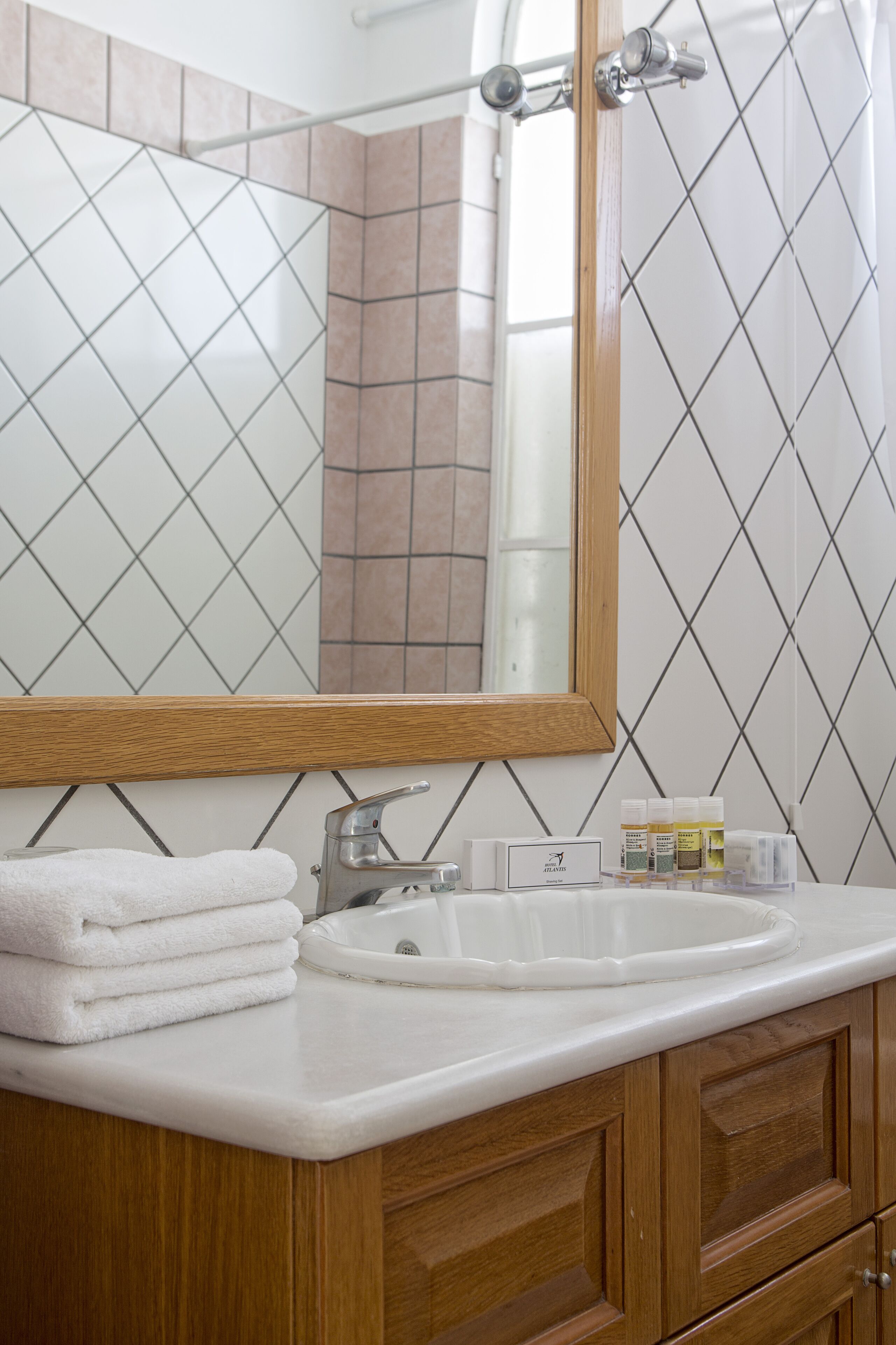 bathtub, hair dryer, dressing gowns, slippers