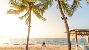 A beach with palm trees and a gazebo. - Sea Sand Sun Resort and Villas (Sattahip)