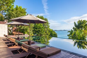 Indoor pool, outdoor pool, pool umbrellas
