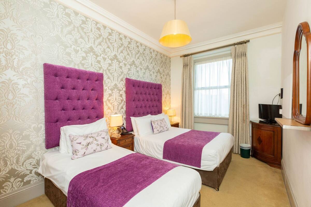 Iron/ironing board (on request), WiFi (free), bed sheets