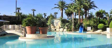 Outdoor pool, open 9:00 AM to 7:30 PM, pool loungers