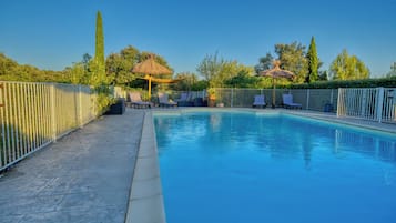 Outdoor pool, pool umbrellas, pool loungers