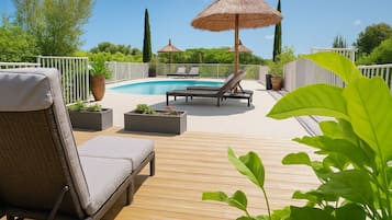 Outdoor pool, pool umbrellas, pool loungers
