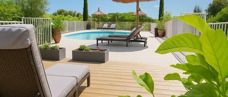 Outdoor pool, pool umbrellas, pool loungers
