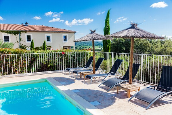 Outdoor pool, pool umbrellas, pool loungers