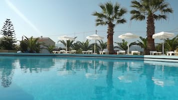 Outdoor pool, pool umbrellas, pool loungers