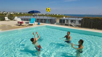 Seasonal outdoor pool, pool loungers