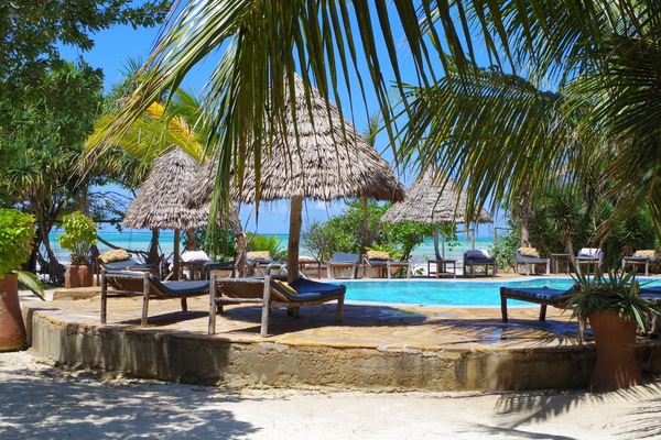 Outdoor pool, open 7 AM to 7 PM, pool umbrellas