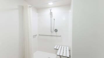 Room, 1 King Bed, Accessible, Non Smoking (Mobility Roll-In Shower) | Bathroom | Combined shower/tub, hair dryer, towels, soap