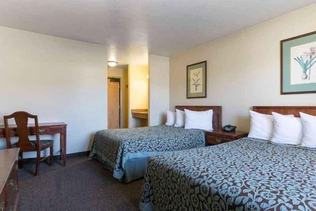 Desk, laptop workspace, blackout curtains, iron/ironing board