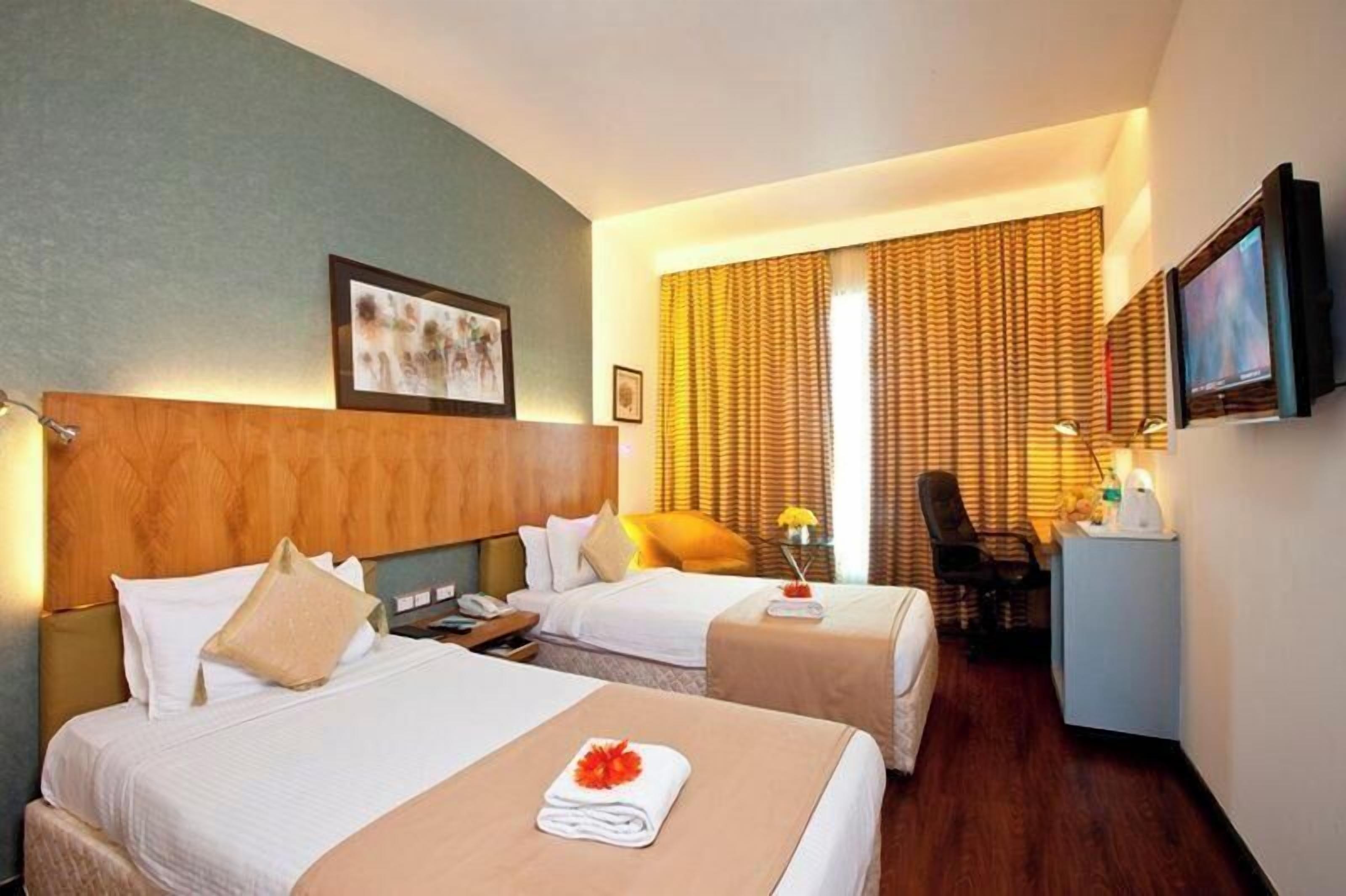 Premium bedding, pillowtop beds, minibar, in-room safe