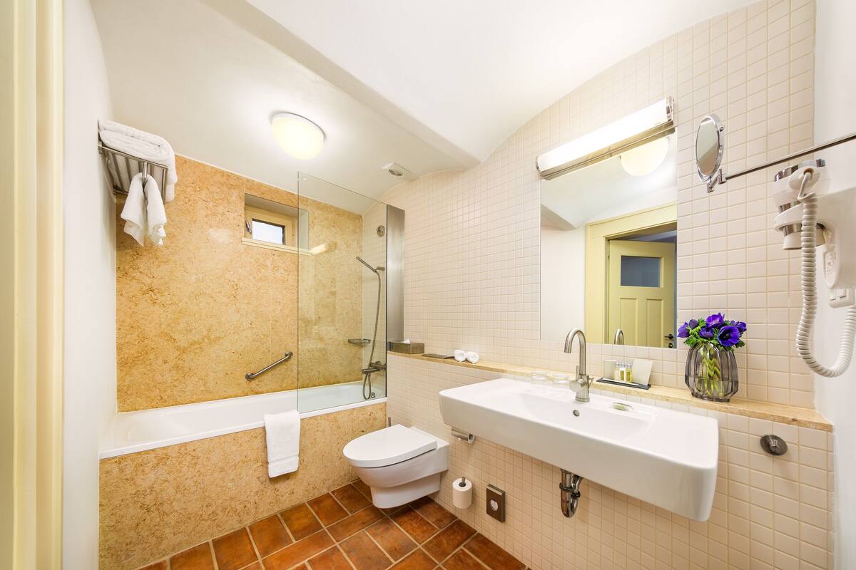 family suite | bathroom | bathtub, spring water bathtub, free toiletries, hair dryer