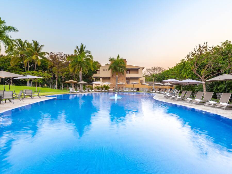2 outdoor pools, open 8:00 AM to 8:00 PM, pool umbrellas, pool loungers