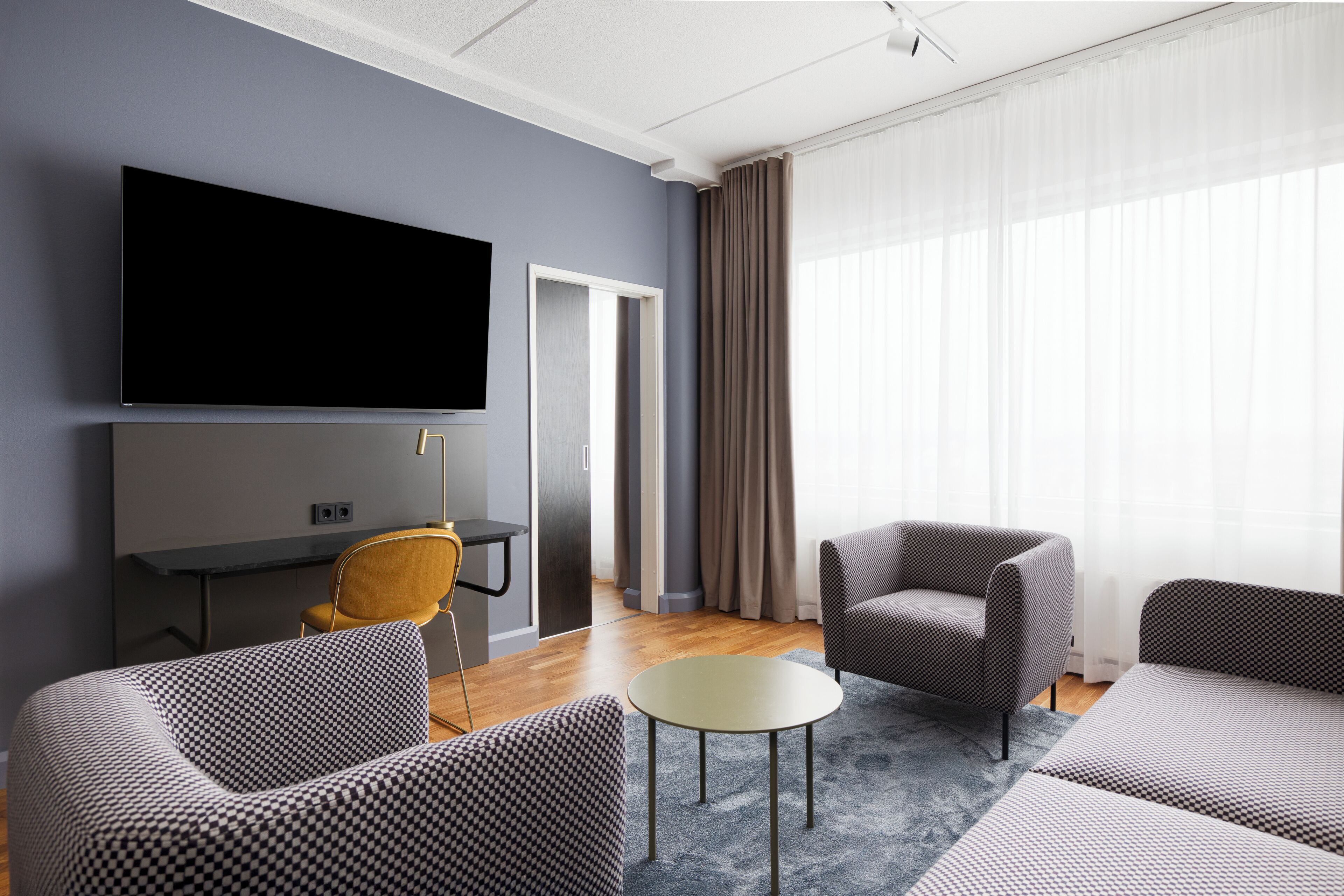 suite, 1 king bed (extra bed possibility) | minibar, in-room safe, desk, laptop workspace