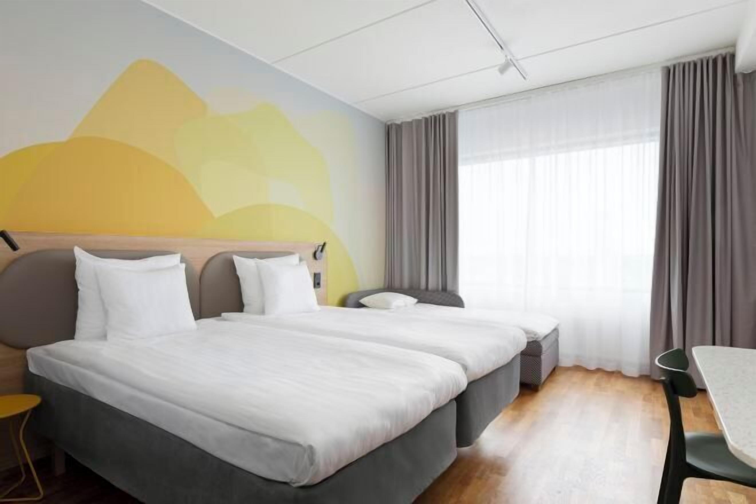 Minibar, caja fuerte, escritorio y espacio para trabajar con un portátil