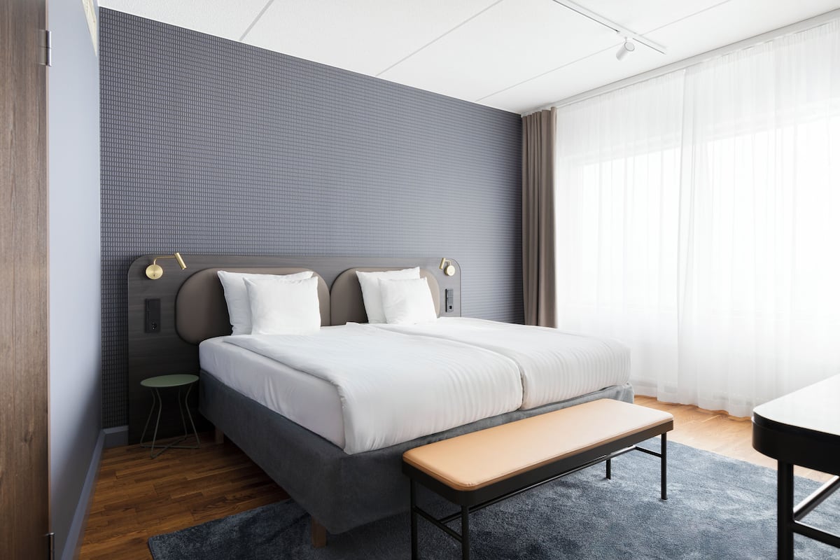 suite, 1 king bed (extra bed possibility) | minibar, in-room safe, desk, laptop workspace