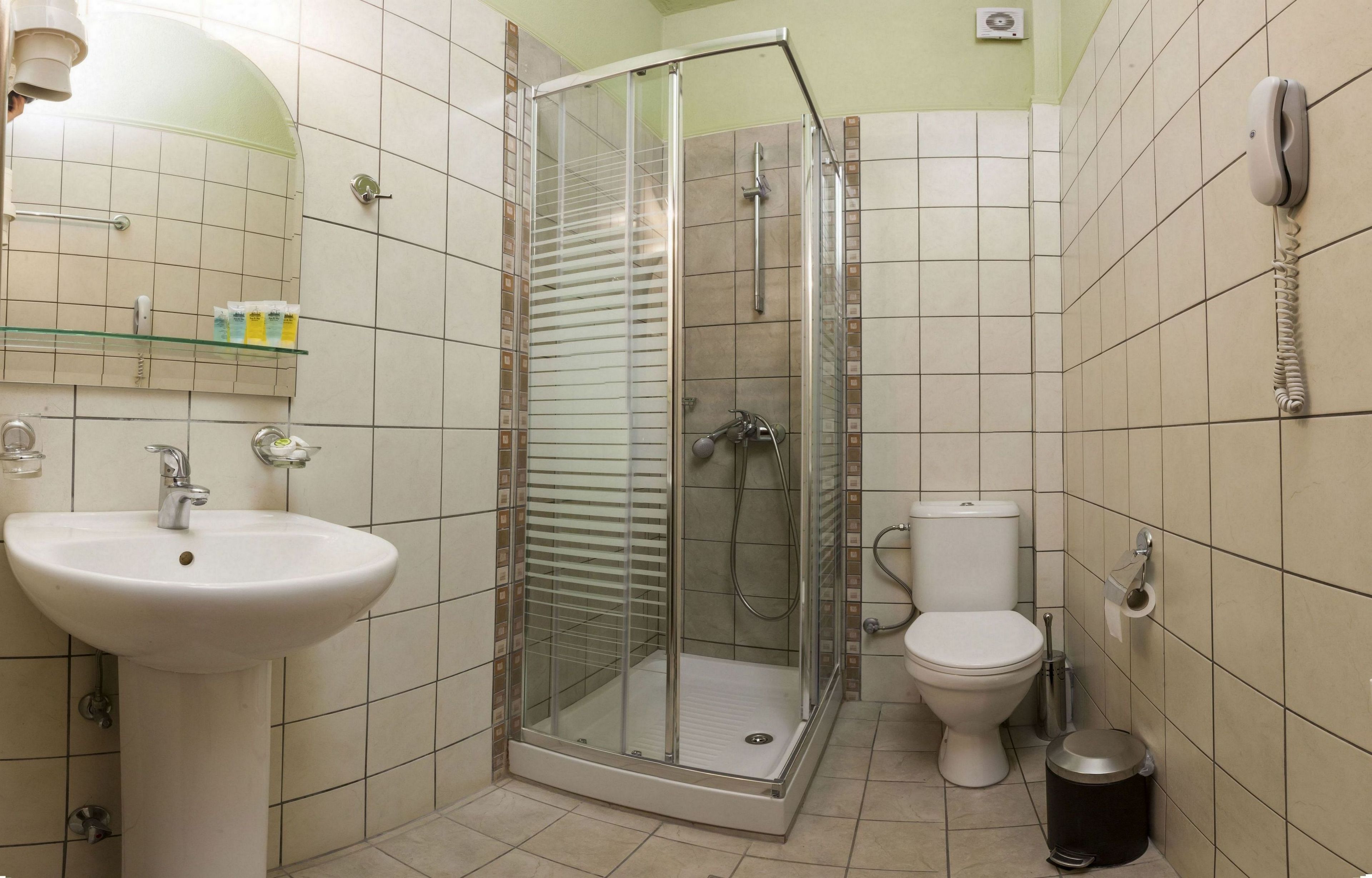 family room (meteora view) | premium bedding, in-room safe, desk, iron/ironing board