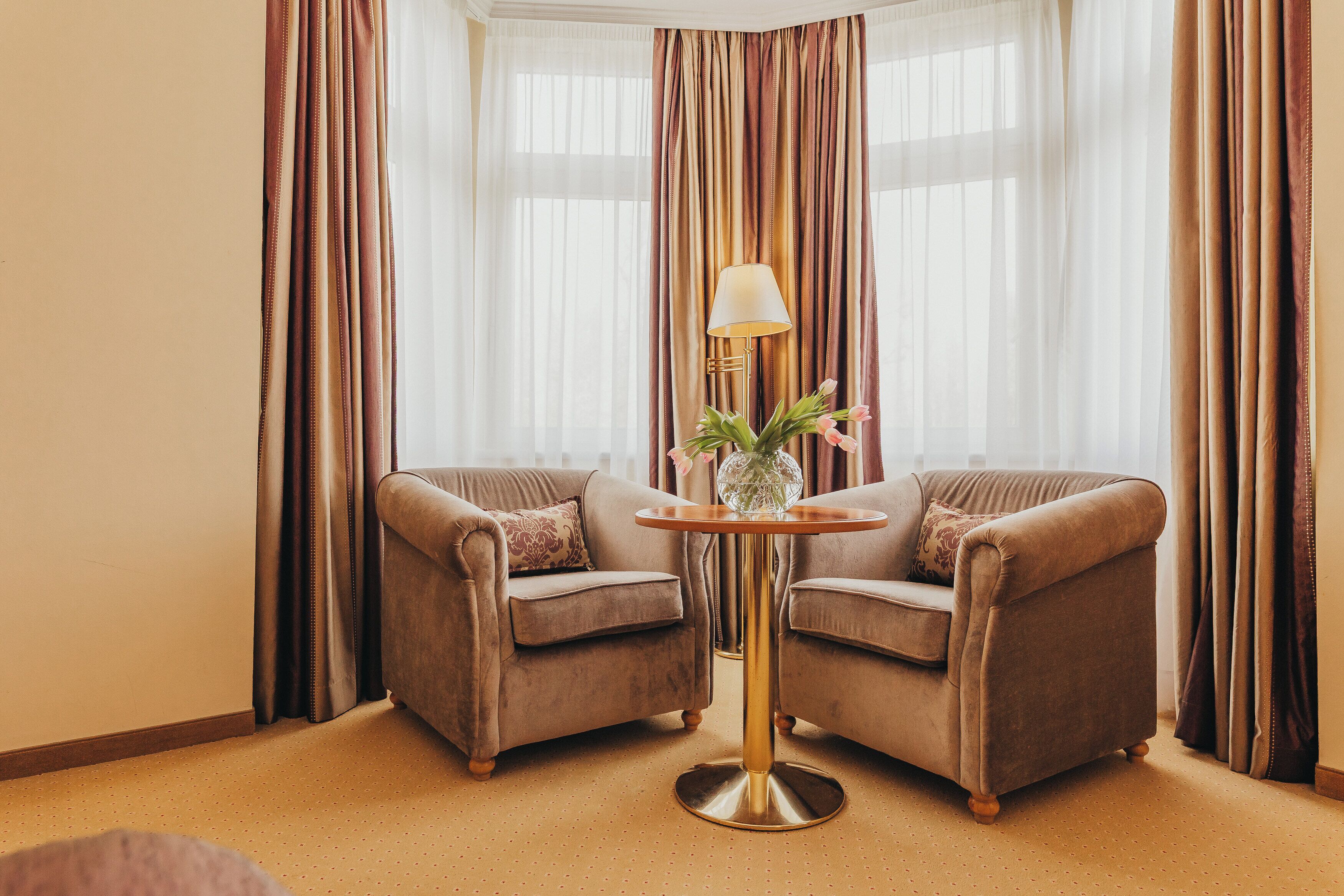 Deluxe Double Room | Living area | Fireplace