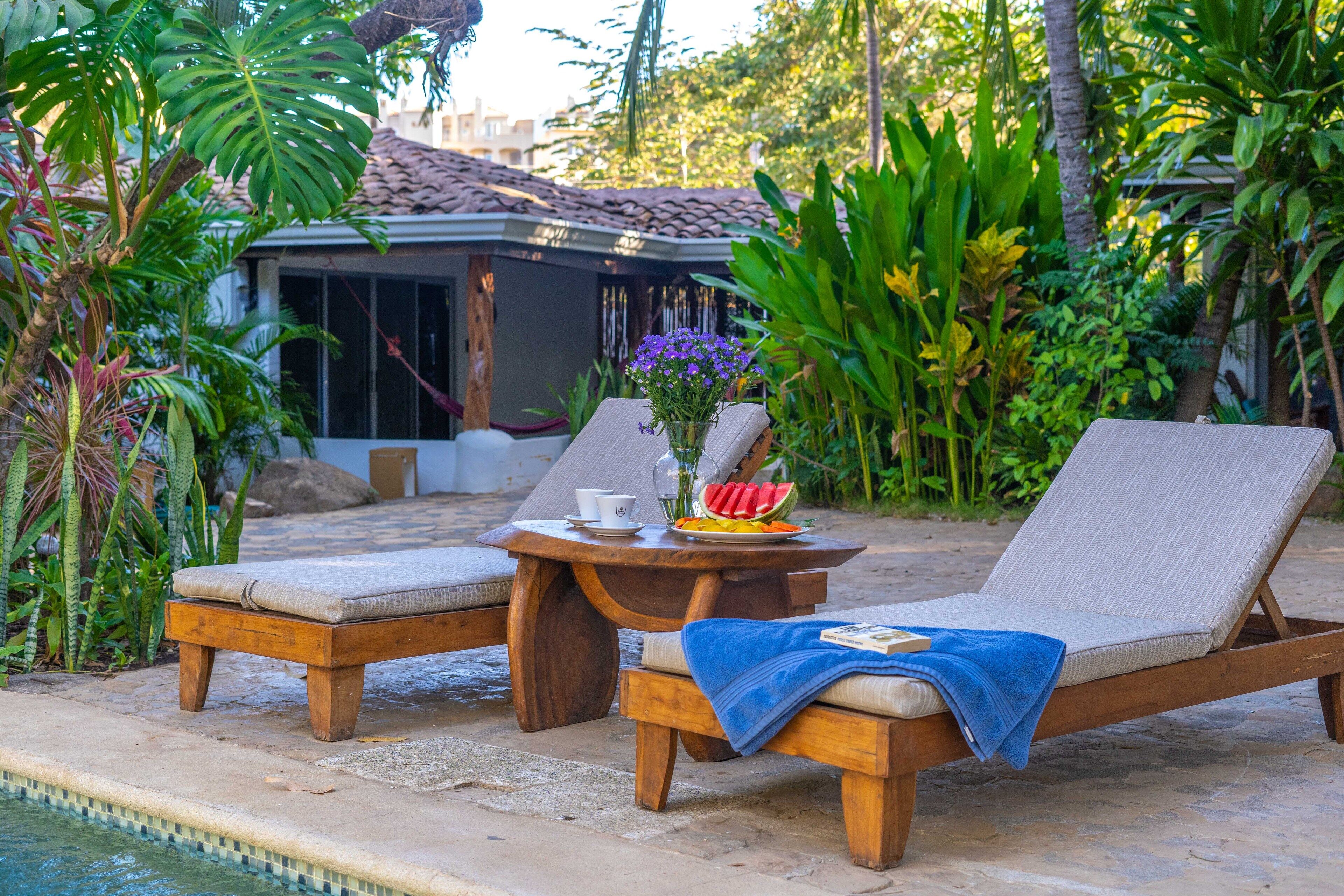 outdoor pool, pool loungers