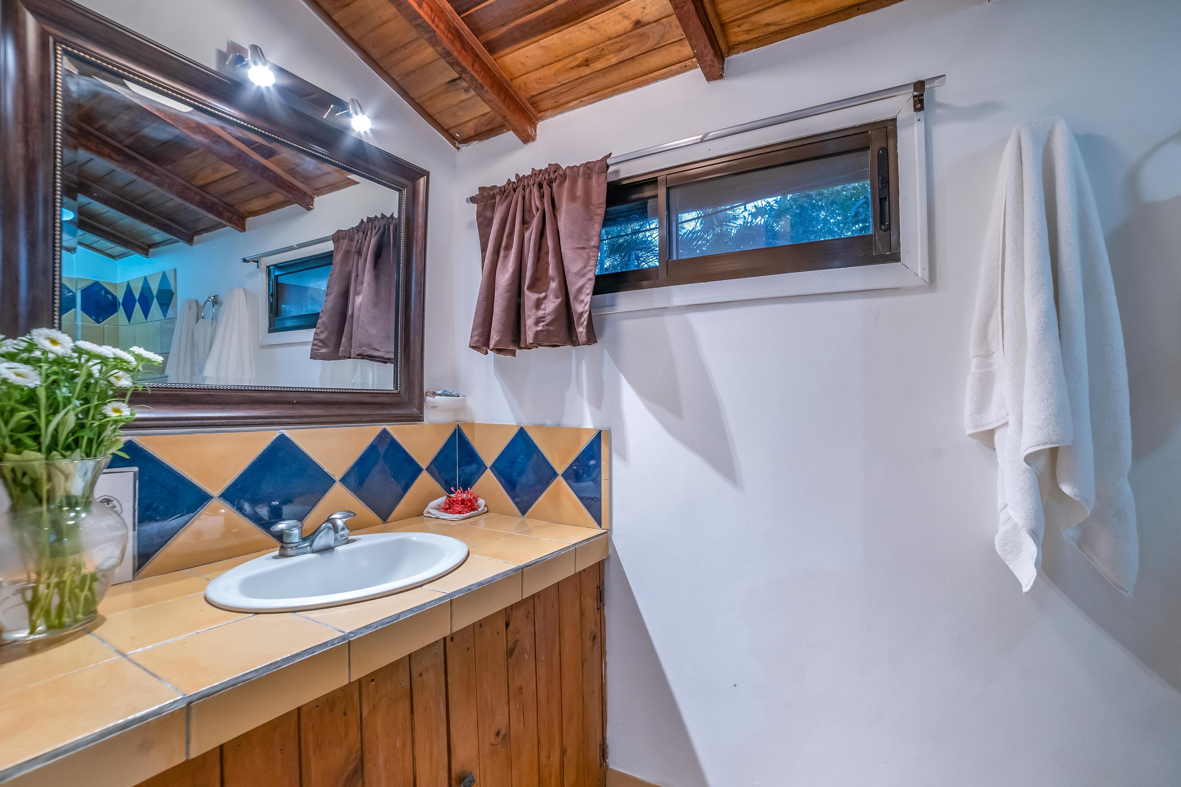 deluxe room, 1 king bed | bathroom | shower, rainfall showerhead, free toiletries, towels