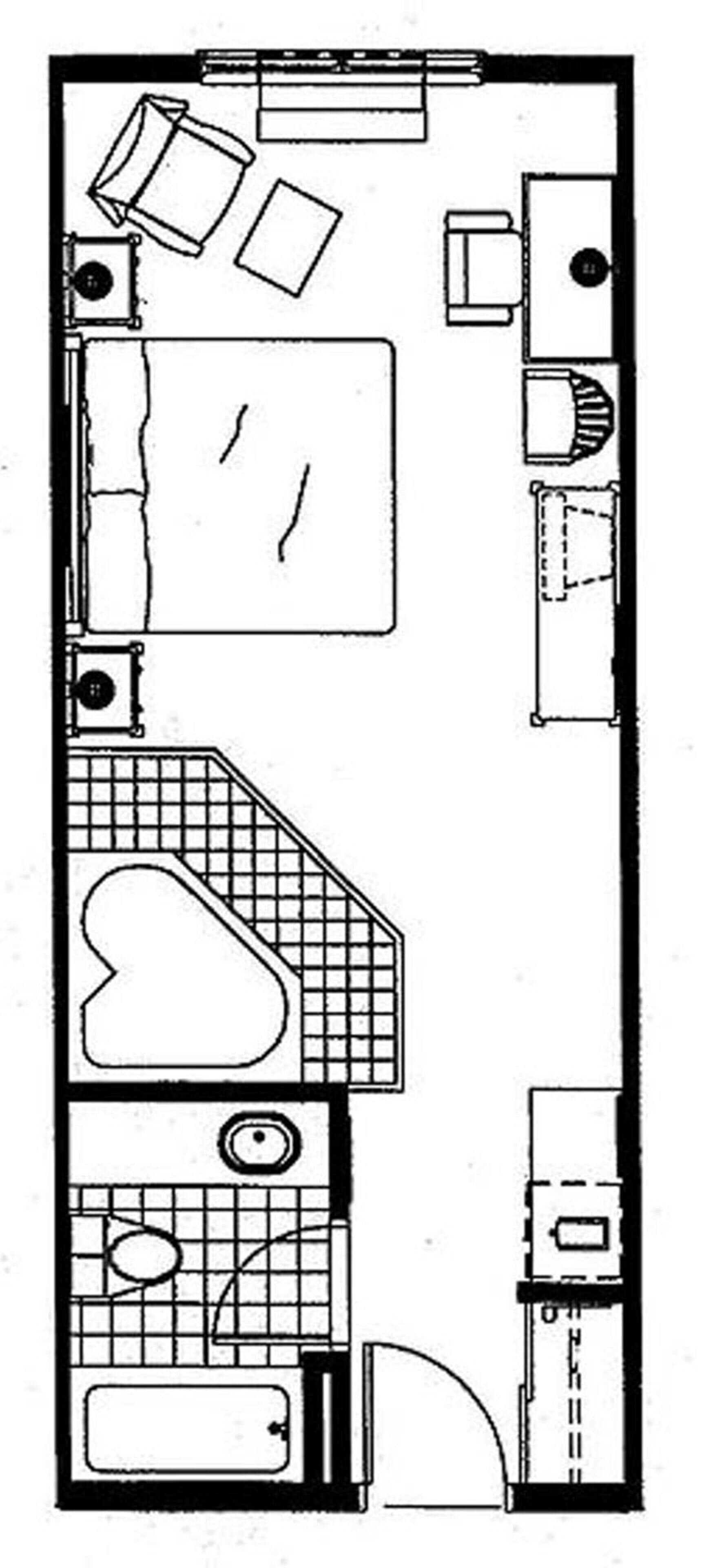 A floor plan of a hotel room with a bed, a bathroom, a kitchen area, and a living space.
