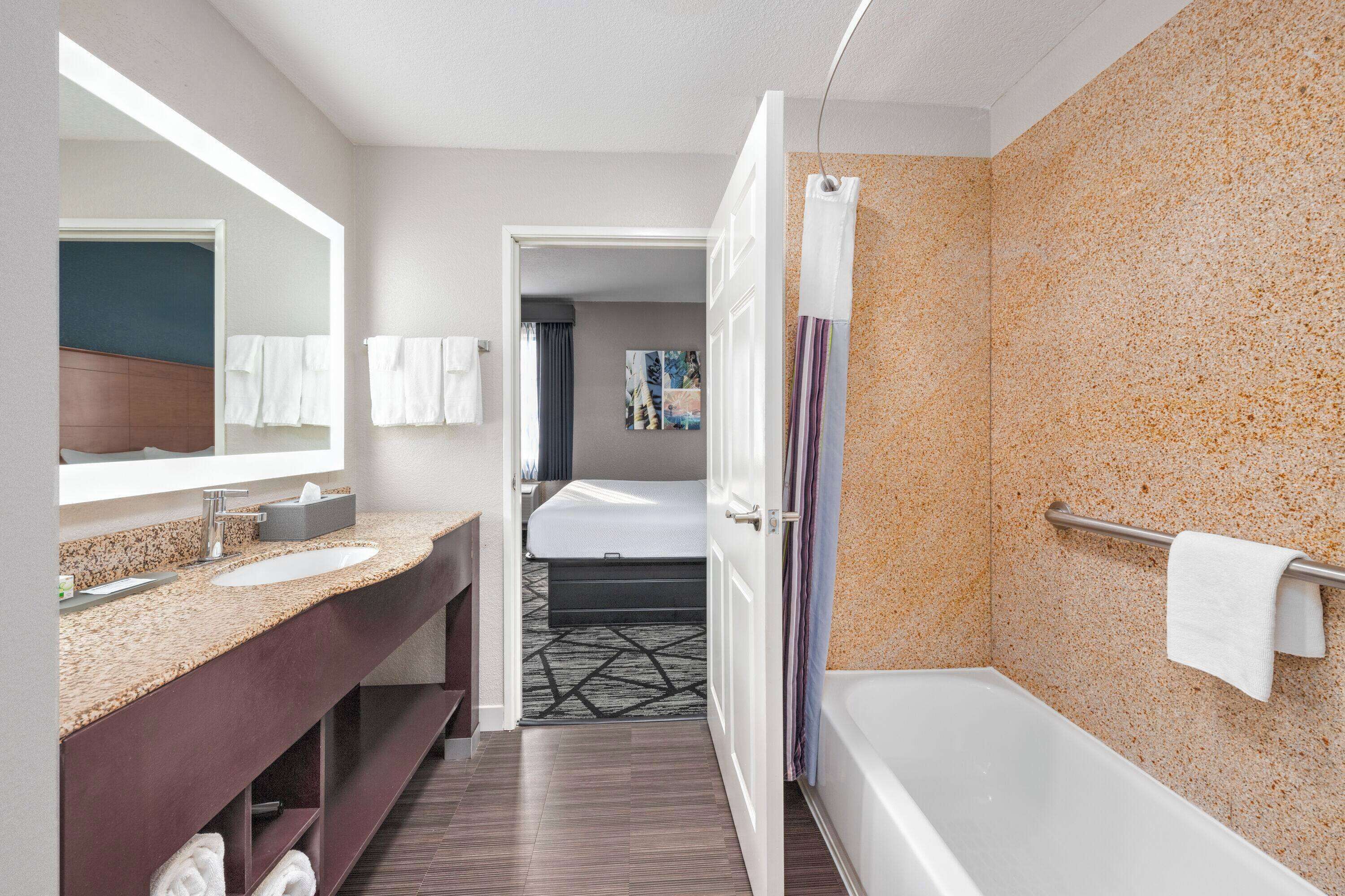 combined shower/bathtub, free toiletries, hair dryer, towels