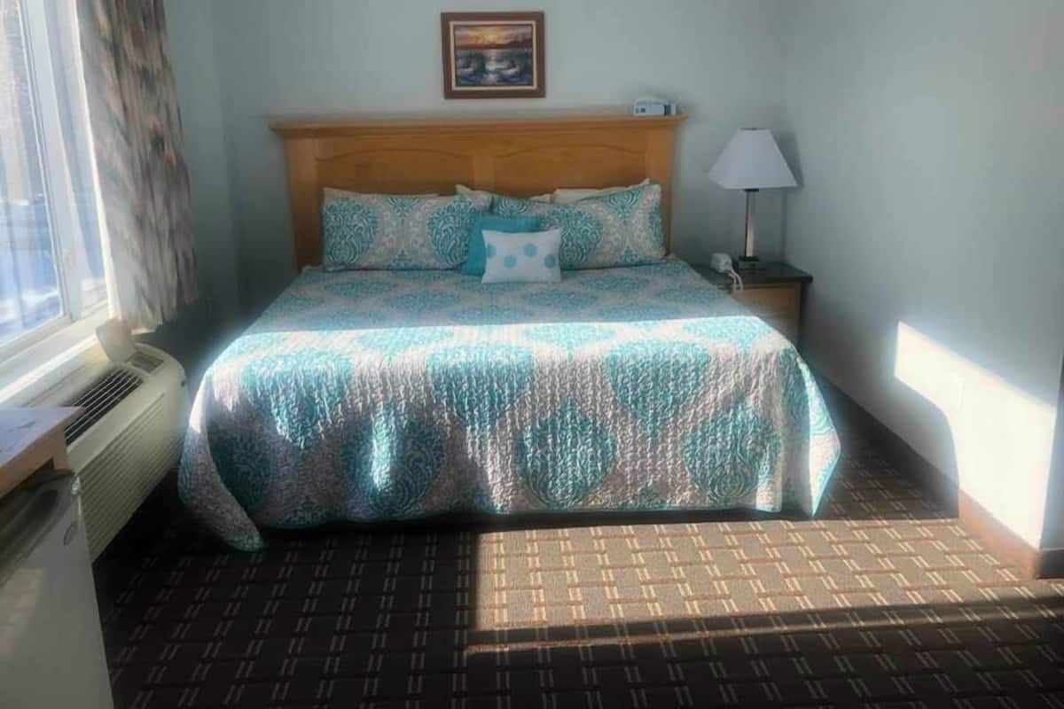 Habitación Prestigio, 1 cama King size, para no fumadores, vista parcial al océano | Ropa de cama de alta calidad y decoración personalizada