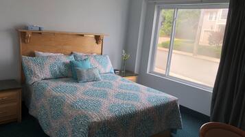 Habitación doble Prestigio, 2 camas Queen size, para no fumadores, vista parcial al océano | Camas extra