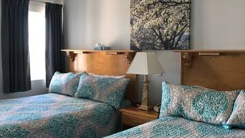 Deluxe Room, 2 Queen Beds, Balcony, Ocean View | Premium bedding, individually decorated, individually furnished