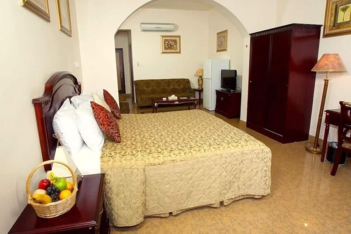 In-room safe, iron/ironing board, WiFi (free), bed sheets