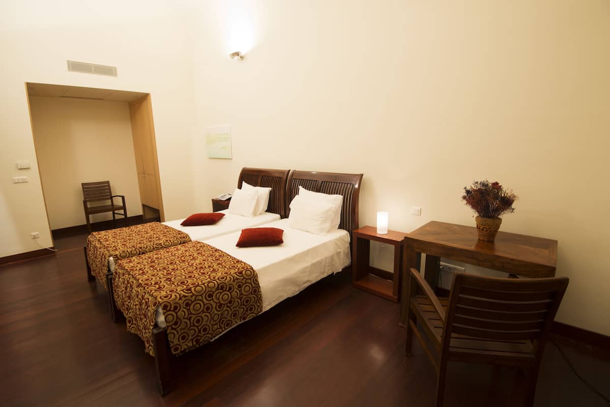 superior room | minibar, in-room safe, desk, iron/ironing board