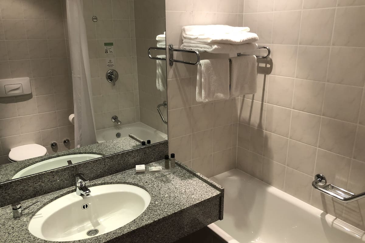 eco-friendly toiletries, hair dryer, towels