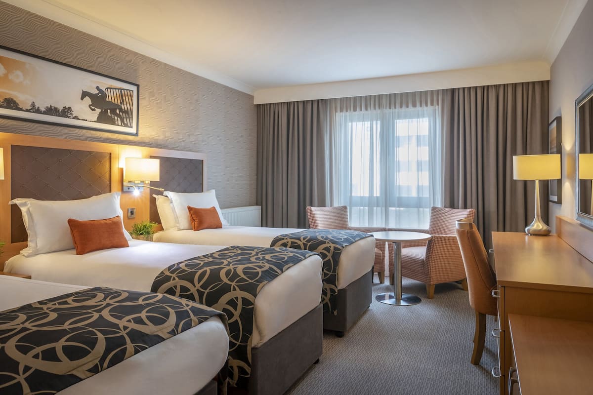 deluxe triple room | hypo-allergenic bedding, in-room safe, desk, blackout curtains