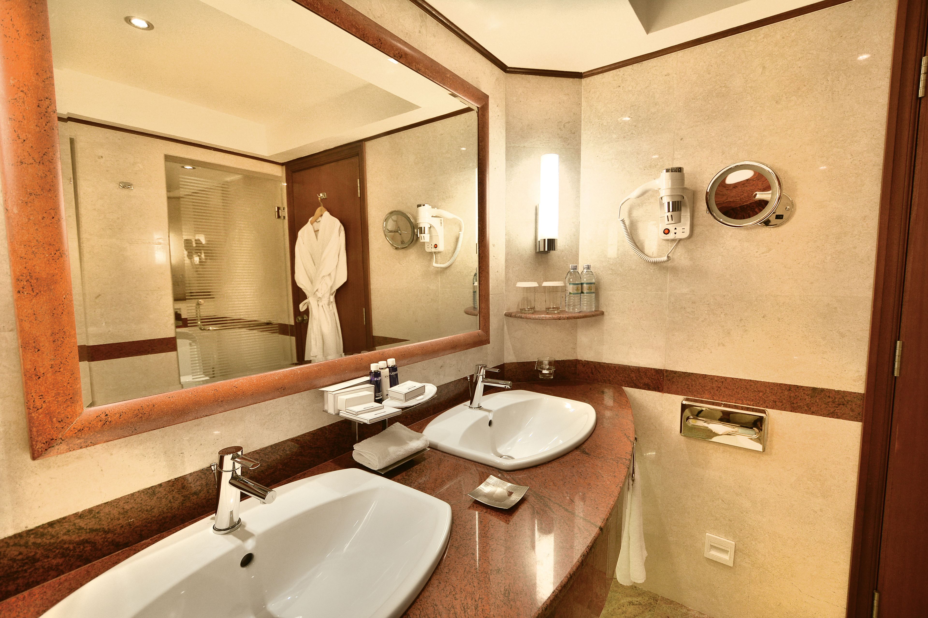 business suite | bathroom | separate bathtub and shower, rainfall showerhead, designer toiletries