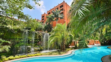 Outdoor pool, open 6:00 AM to 6:00 PM, pool umbrellas, sun loungers