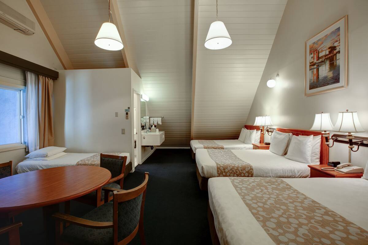 family quadruple room, multiple beds | premium bedding, blackout curtains, soundproofing, iron/ironing board