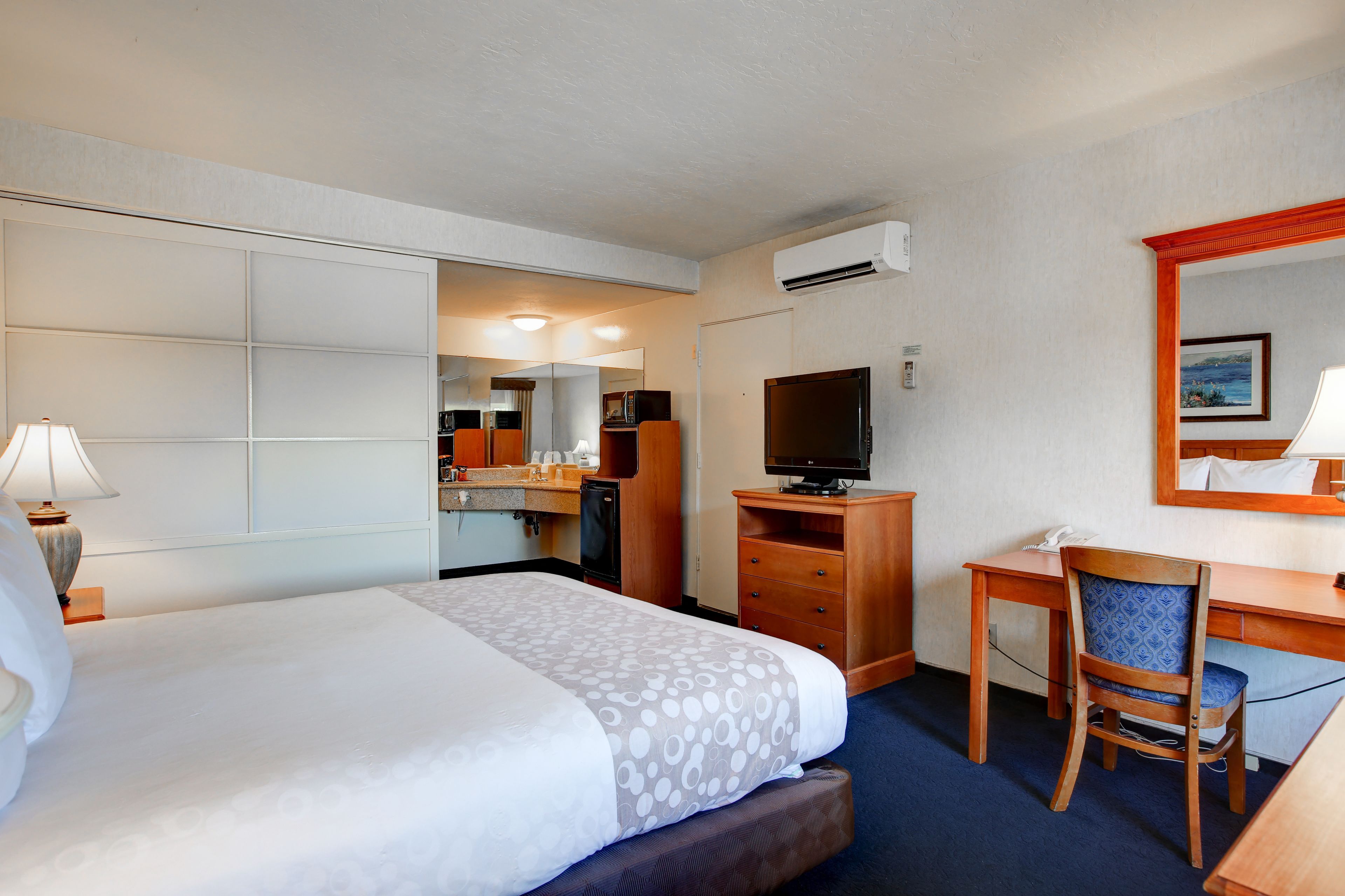 deluxe room, 1 king bed | premium bedding, blackout curtains, soundproofing, iron/ironing board