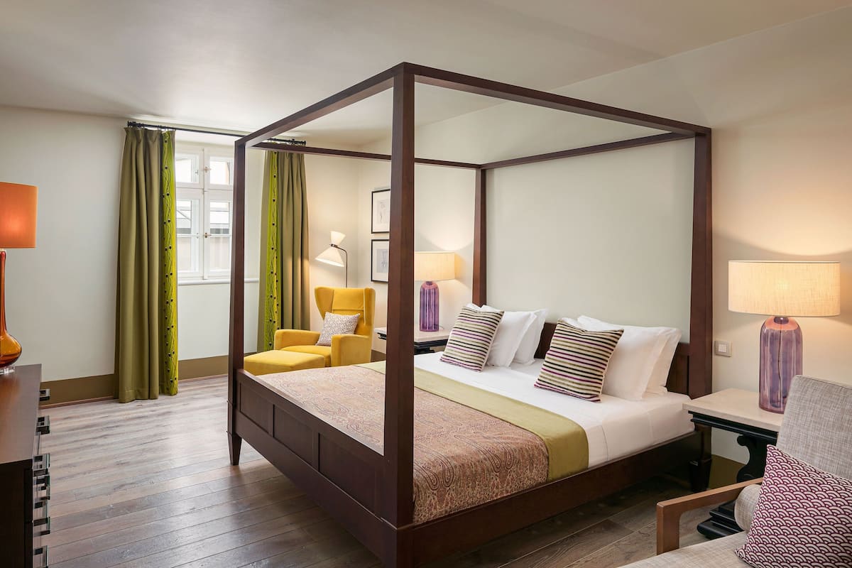 family suite, 2 bedrooms, fireplace (moser) | premium bedding, minibar, in-room safe, individually decorated