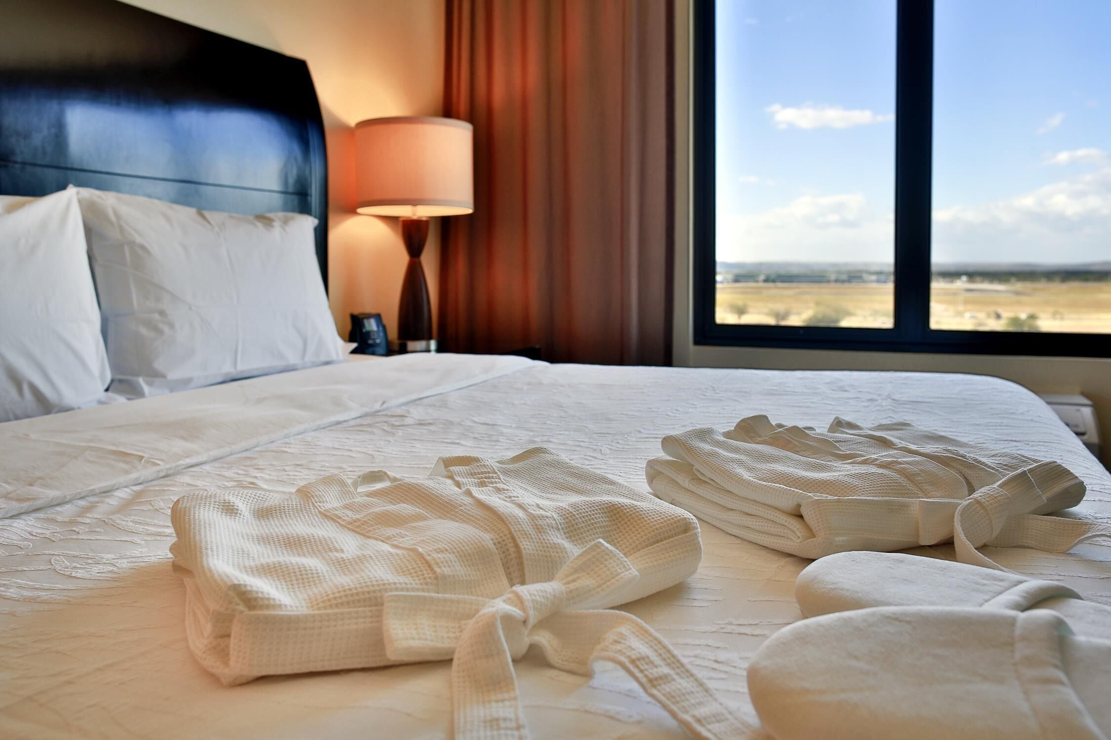 Hypoallergeen beddengoed, een kluis op de kamer, een bureau