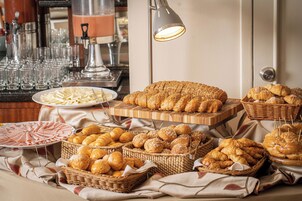 Daily buffet breakfast (USD 12 per person)