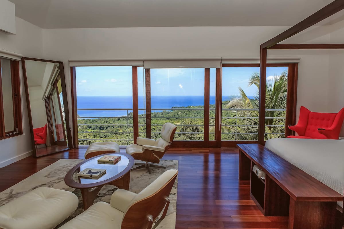 deluxe room, multiple beds, ocean view | in-room safe, desk, blackout curtains, free wifi