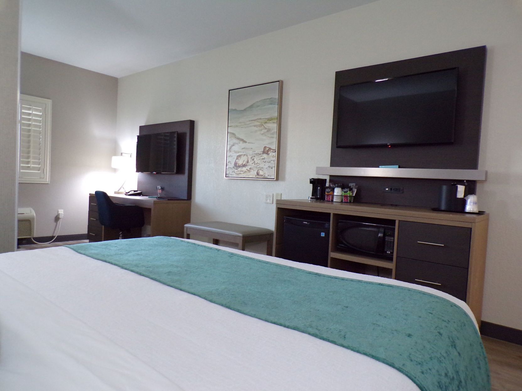 Camas com colchões pillow-top, individualmente decorados