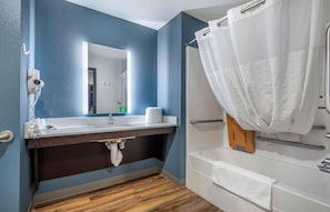 Combined shower/tub, hair dryer, towels, soap